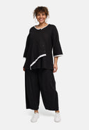 'Saria' Blouse – asymmetrisch, licht & natuurlijk