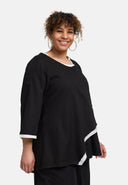 'Saria' Blouse – asymmetrisch, licht & natuurlijk